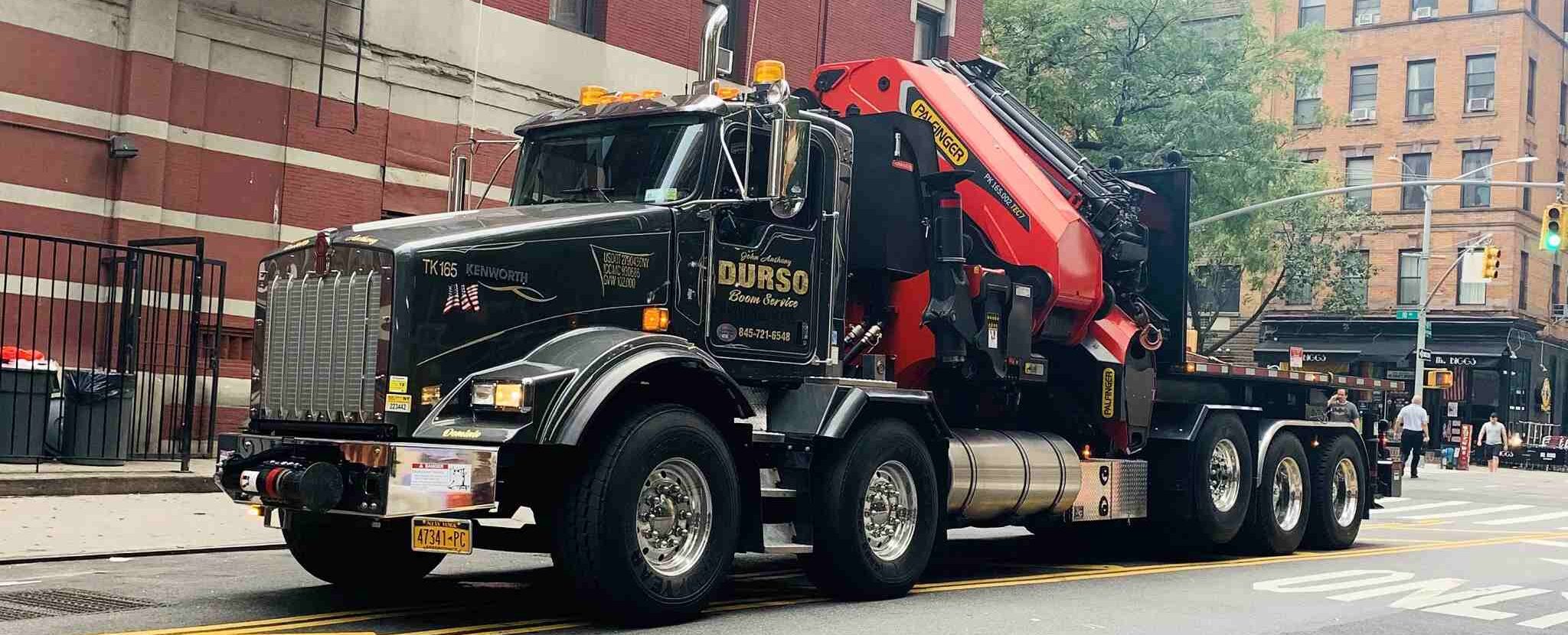 durso knuckleboom truck at job site